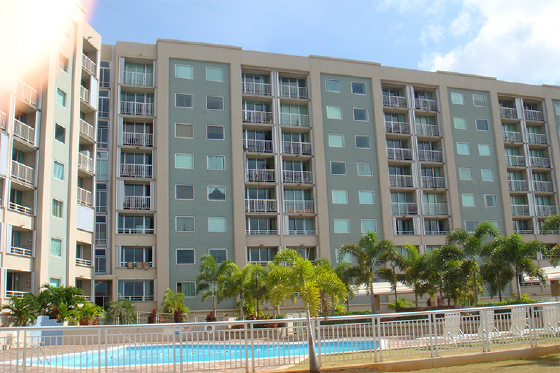 A swimming pool stands near the Residential building